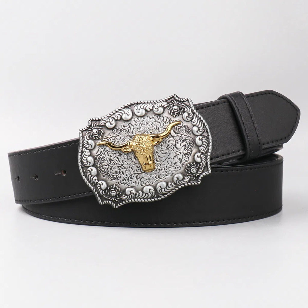 Black Western belt with a large antique silver filigree buckle centered on a gold longhorn steer head, shown flat