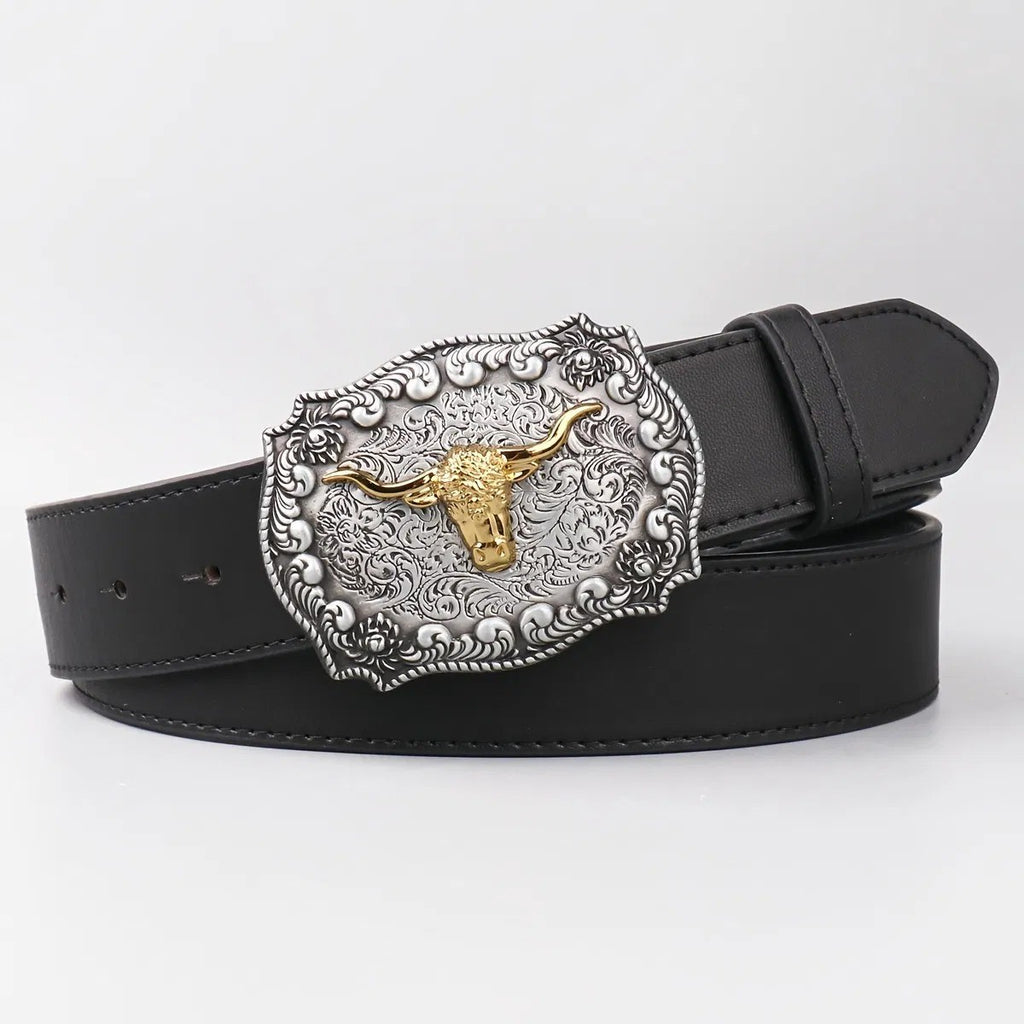 Close-up of the antique silver tone filigree scrollwork framing the gold tone longhorn steer head buckle