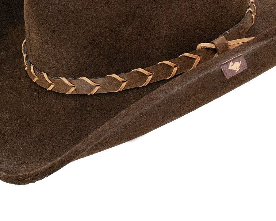 Close-up of the Villy hat's braided leather band and silver concho on brown wool felt